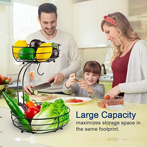 Family in kitchen using a two-tier fruit basket.