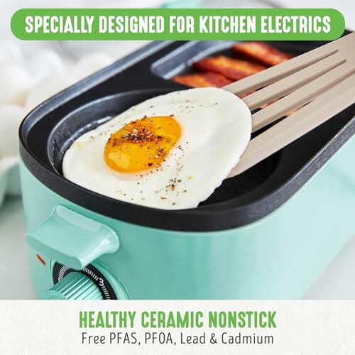 Fried egg on ceramic nonstick pan with kitchen electric features.