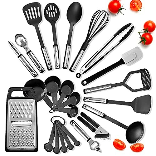 Assorted kitchen utensils with tomatoes