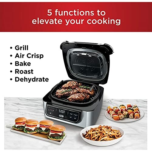 Multifunction cooker with grill, air crisp, bake, roast, dehydrate options and cooked food