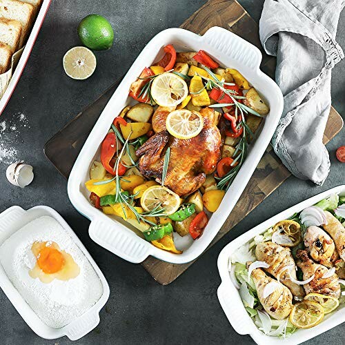 Roast chicken with vegetables in a baking dish.